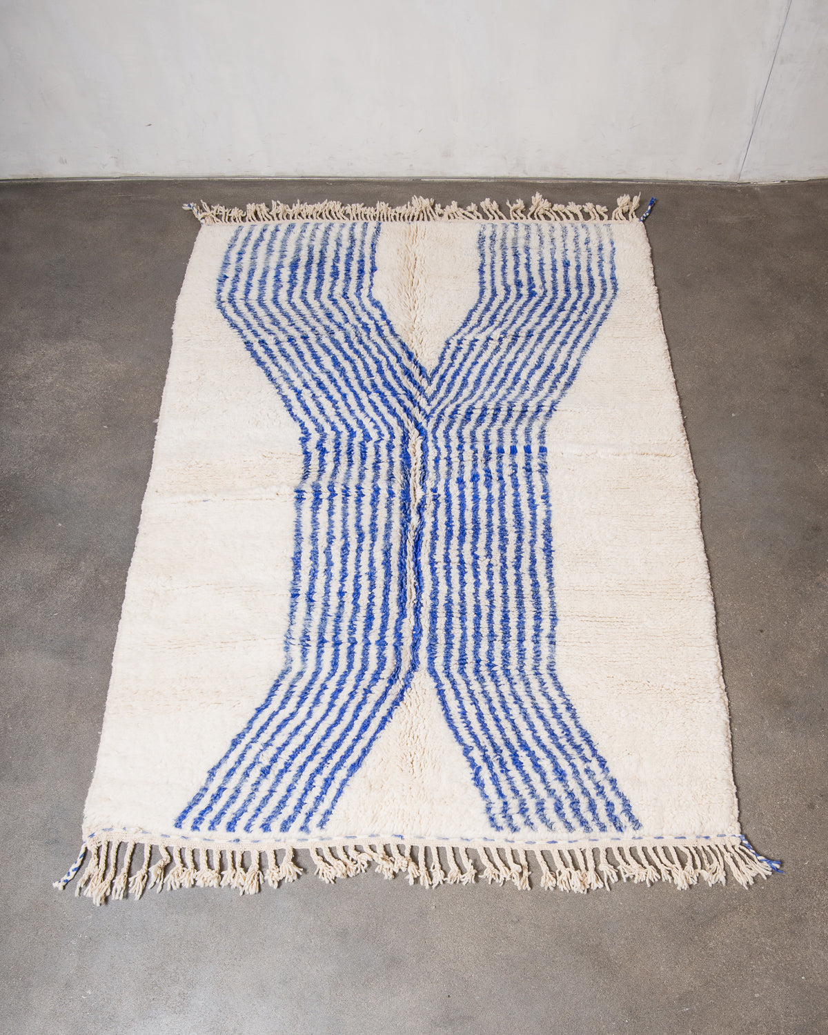 Modern, designer, handcrafted Berber rug from Morocco. Beniourain carpet with beautiful colours and patterns and fluffy wool texture.